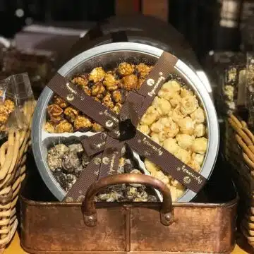 Elegant gift tin filled with handmade popcorn
