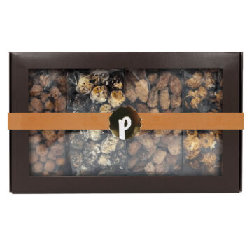 Fancy gift box with gourmet popcorn and artisan candied nuts