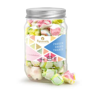 Transparent jar showcasing a mix of pastel-colored, gourmet, freeze-dried marshmallows with a light and airy texture.