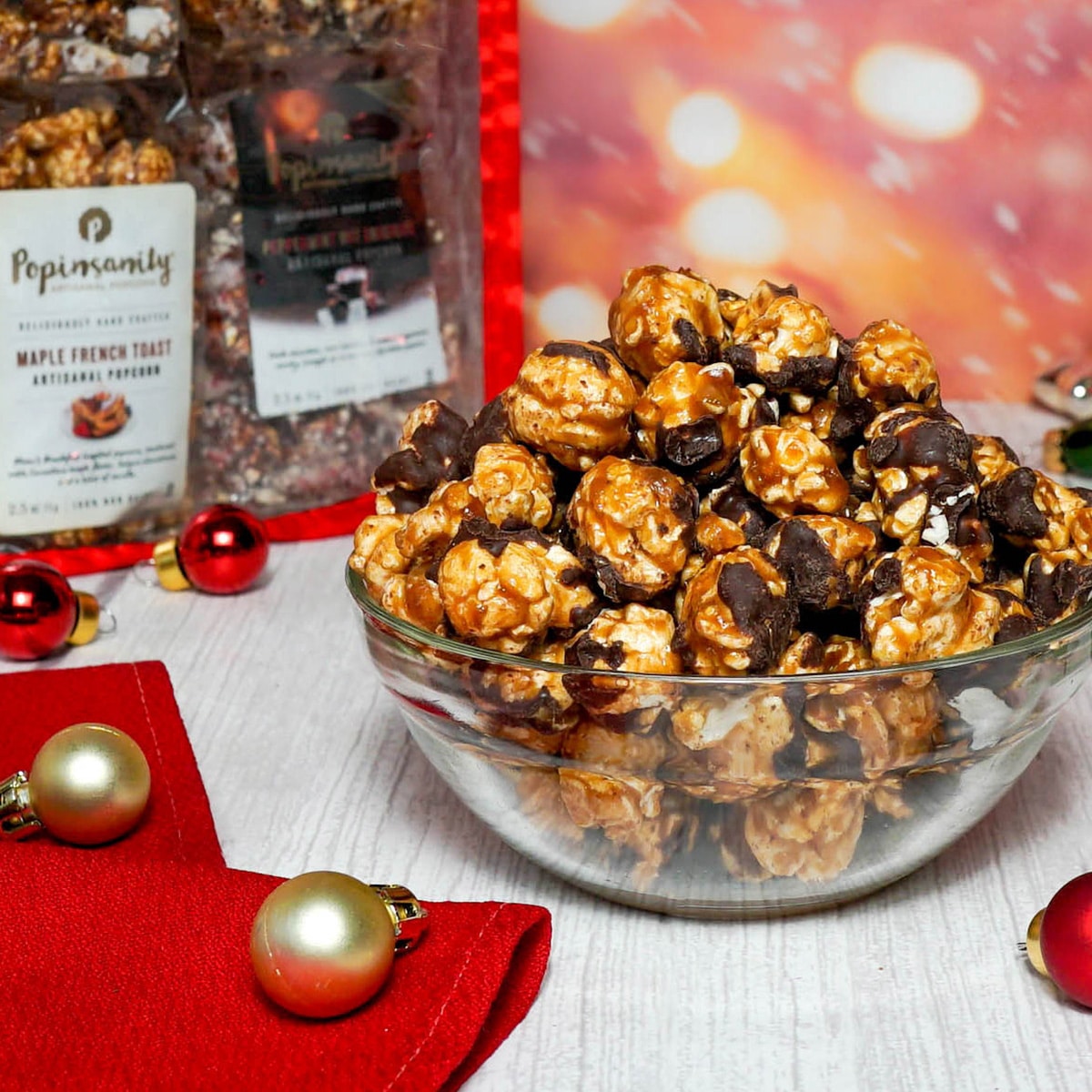 8BAGRED-2 Chocolate covered artisan popcorn in a gorgeous red gift bag
