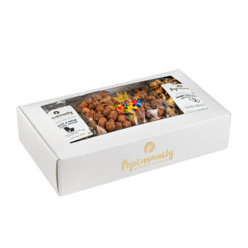 Non-dairy Purim Gift Box featuring gourmet caramel chocolate drizzle popcorn, sweet cinnamon crunch almonds, and raspberry peanuts