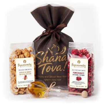 Rosh Hashanah gift bag with Apples & Honey gourmet popcorn, Pomegranate flavor popcorn, and a honey candy spoon