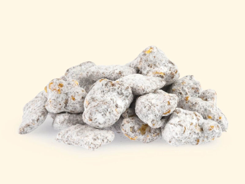 Craggy mountains of roasted peanut butter and cocoa-coated popcorn, heavily dusted in a thick, snowy layer of powdered sugar.